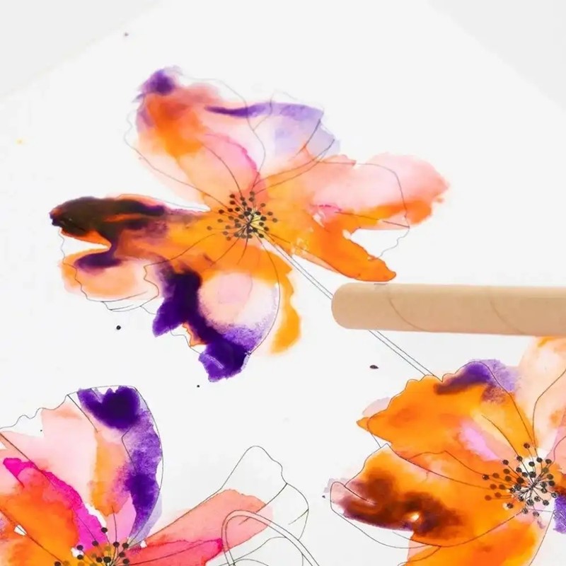 Aquarelverf blazen met een rietje voor bijzondere effecten
