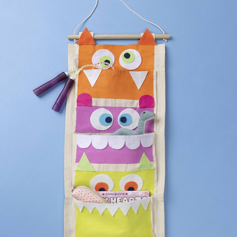 Vrolijke monsteropberger voor de kinderkamer