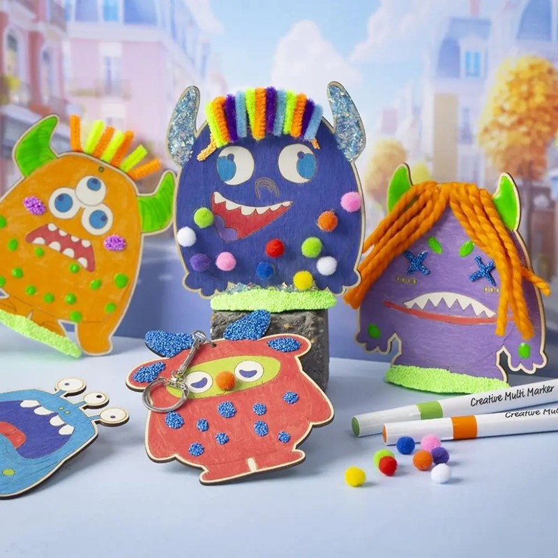 Kleurrijke monsters maken van Foam Clay en pompons